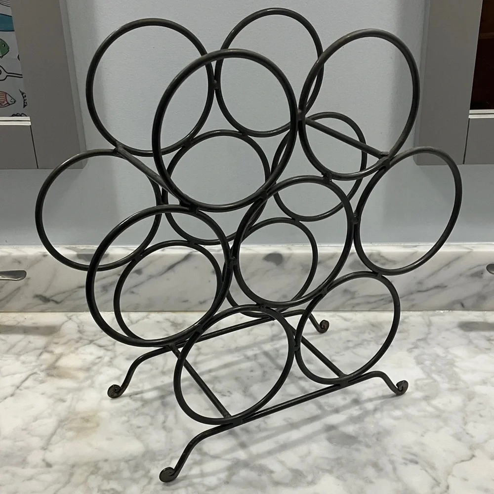 Gray Metal Wine Rack- 7 bottle, free standing, honeycomb style, circular, 4 legs